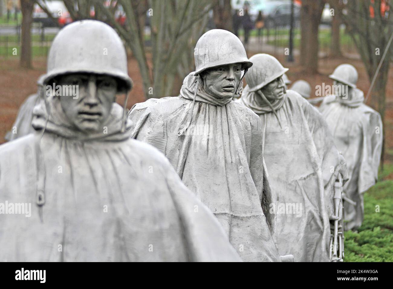A close-up shot of statues of Korean war servicemen near the Korean War ...