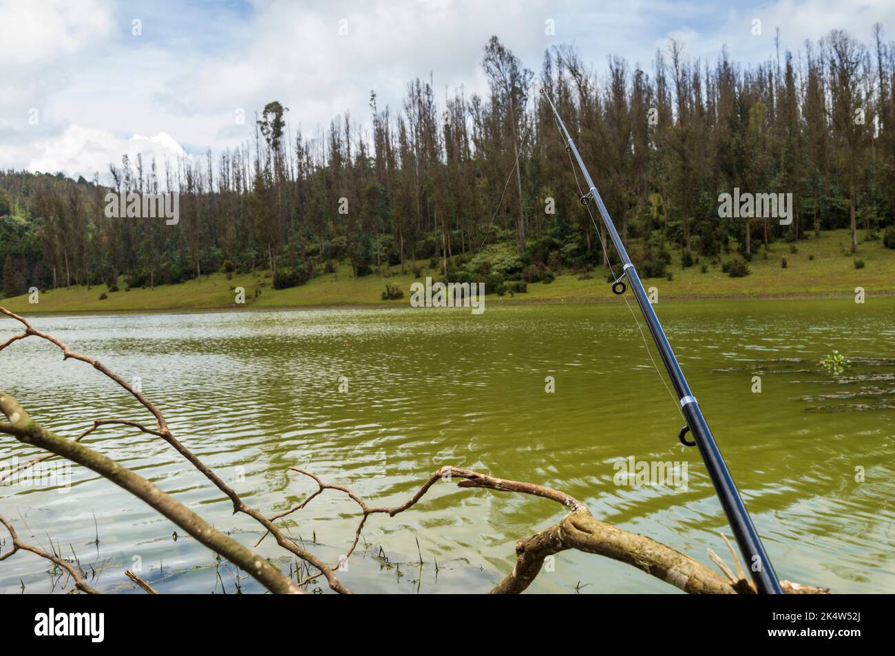 To go on a long journey by exploring and enjoying the scenery for fishing in Ooty Stock Photo