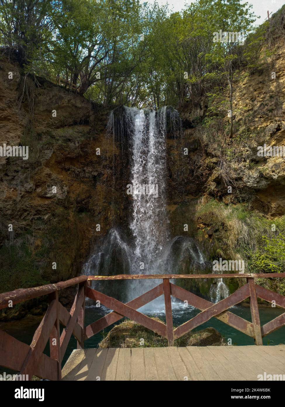 Beautiful view of a waterfall in the forest Stock Photo - Alamy