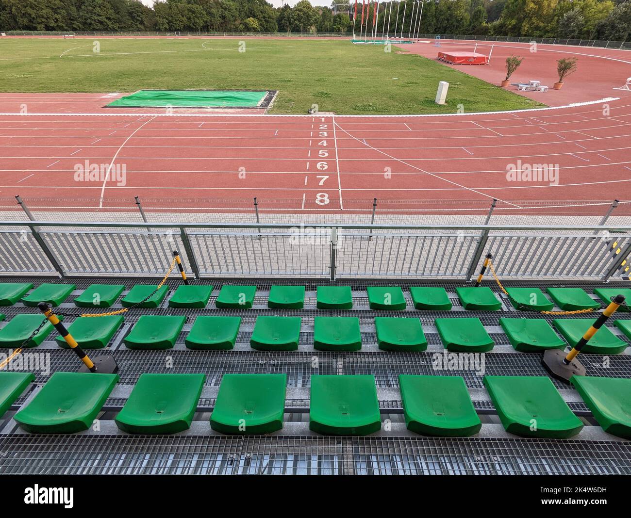 An aerial view of the empty green seats in track and field stadium