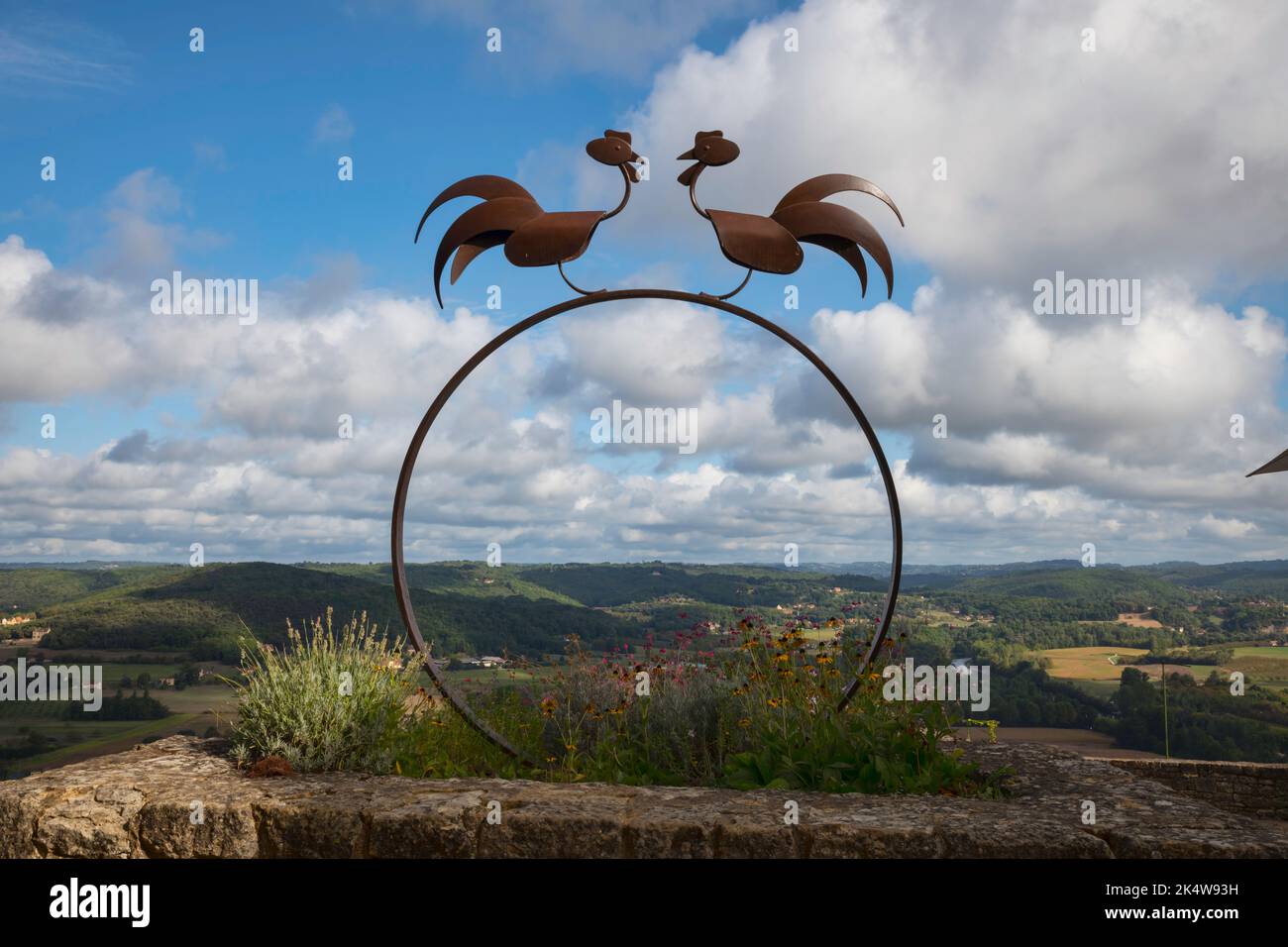 Symbolic roosters and view of the Dordogne Stock Photo