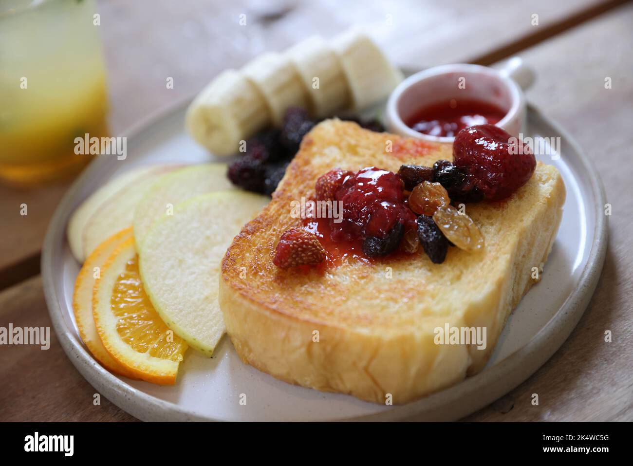 Toast breakfast with dried berry and jam on wood background Stock Photo ...