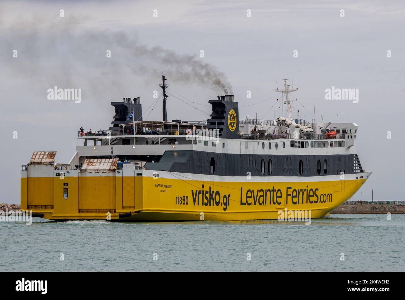 levante ferries ferry leaving the port of zante or zakynthos town sailing for the mainland of greece carrying both vehicles and passengers. Stock Photo