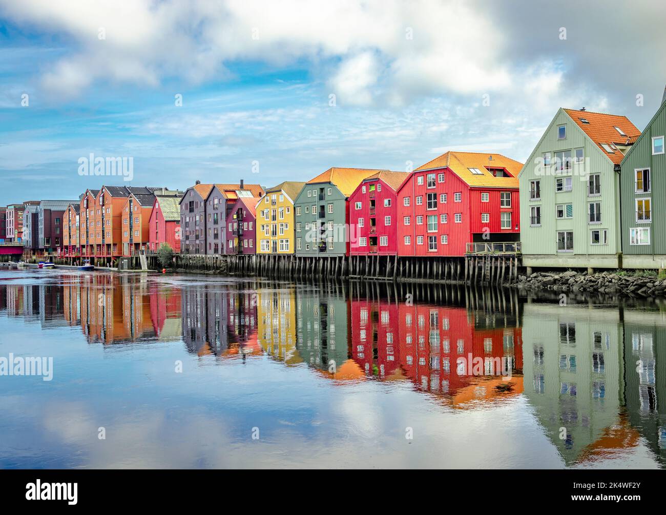 The inner city's iconic waterside warehouses by the river Nidelven , one of the most distinctive historical vernacular building types in Trondheim, No Stock Photo