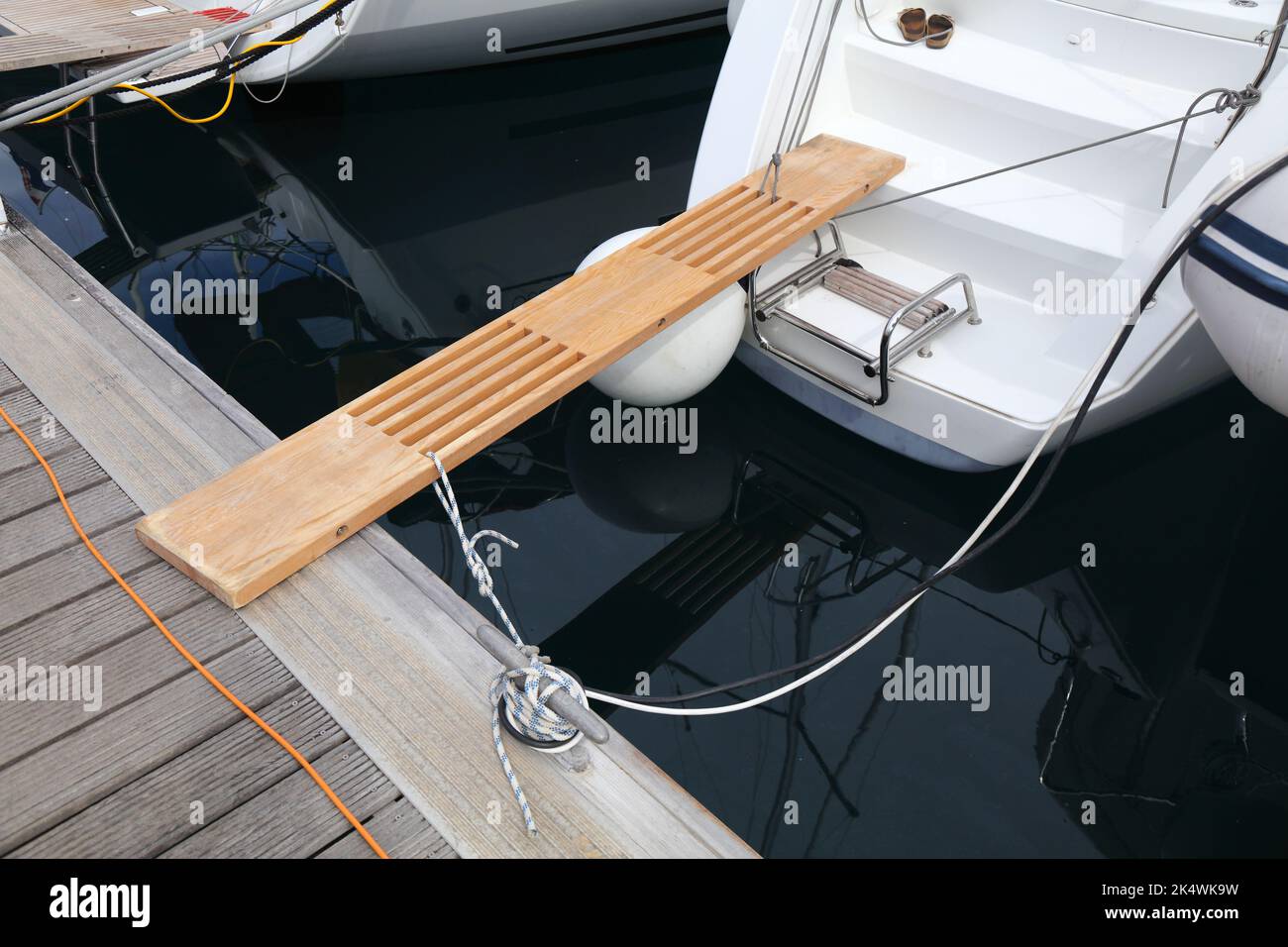 Sailing in Split, Croatia. Sailing yacht wooden boarding gangplank