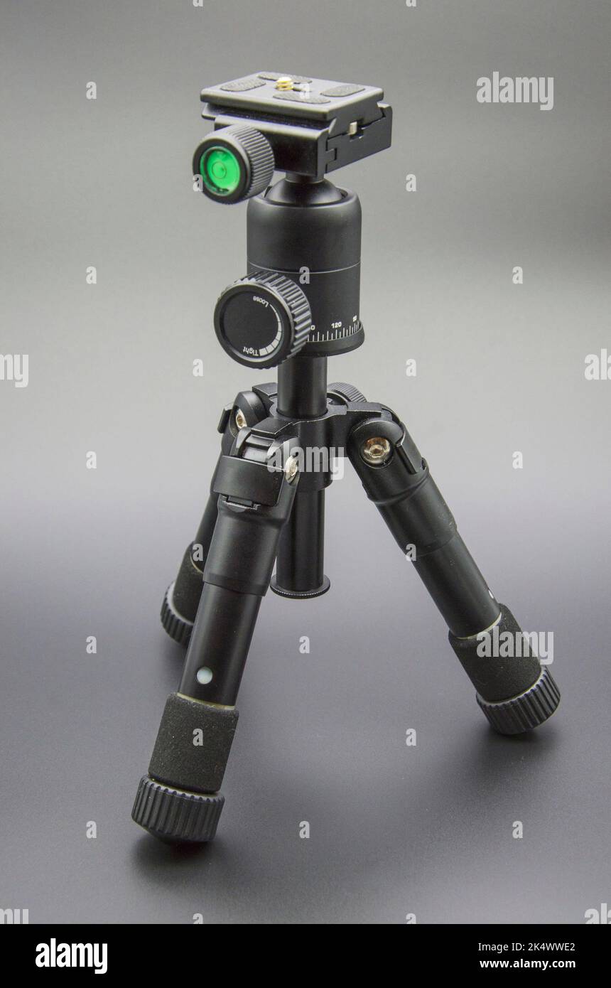 Professional adjustable telescopic camera tripod Stock Photo Alamy