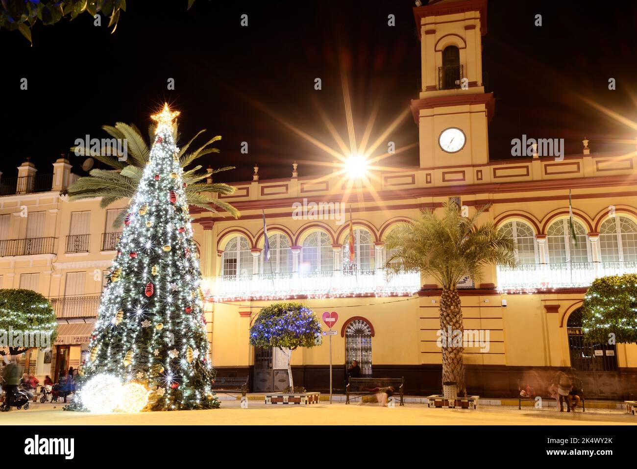 Arahal (Seville). Spain. December 14, 2021. Christmas tree and urban Christmas decorations in a town square. Urban Christmas scene in a village in sou Stock Photo