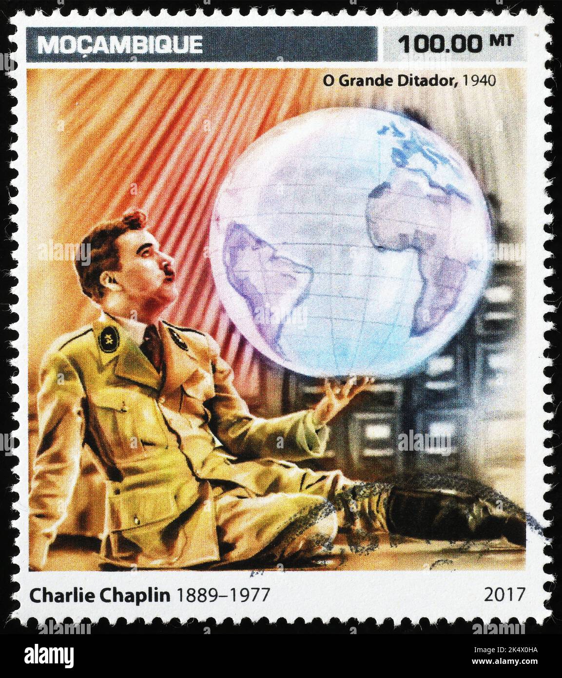 Scene from The Great Dictator by Chalie Chaplin on postage stamp Stock Photo