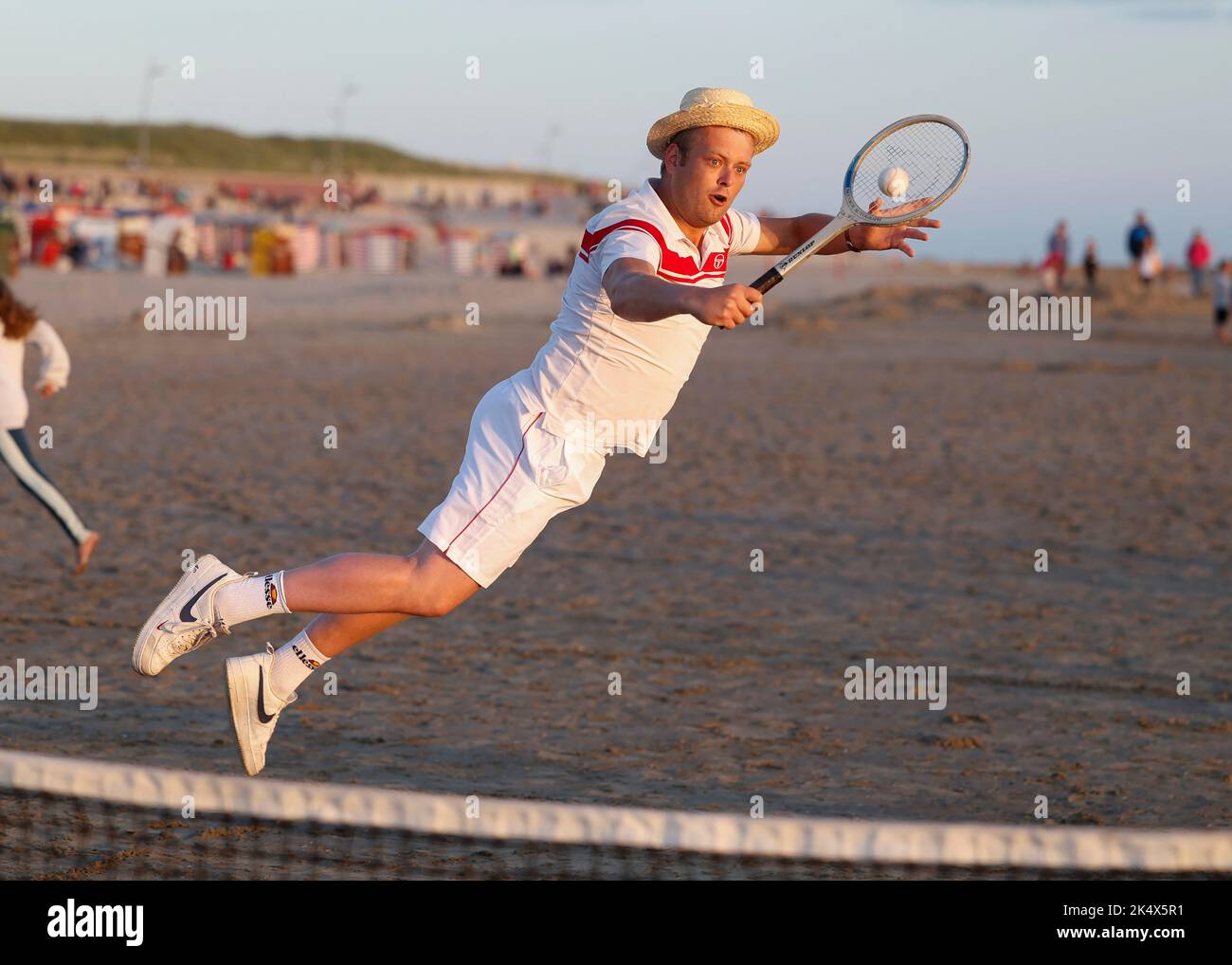 Retro tennis on the beach in the evening sun on the island of Borkum, Germany Stock Photo
