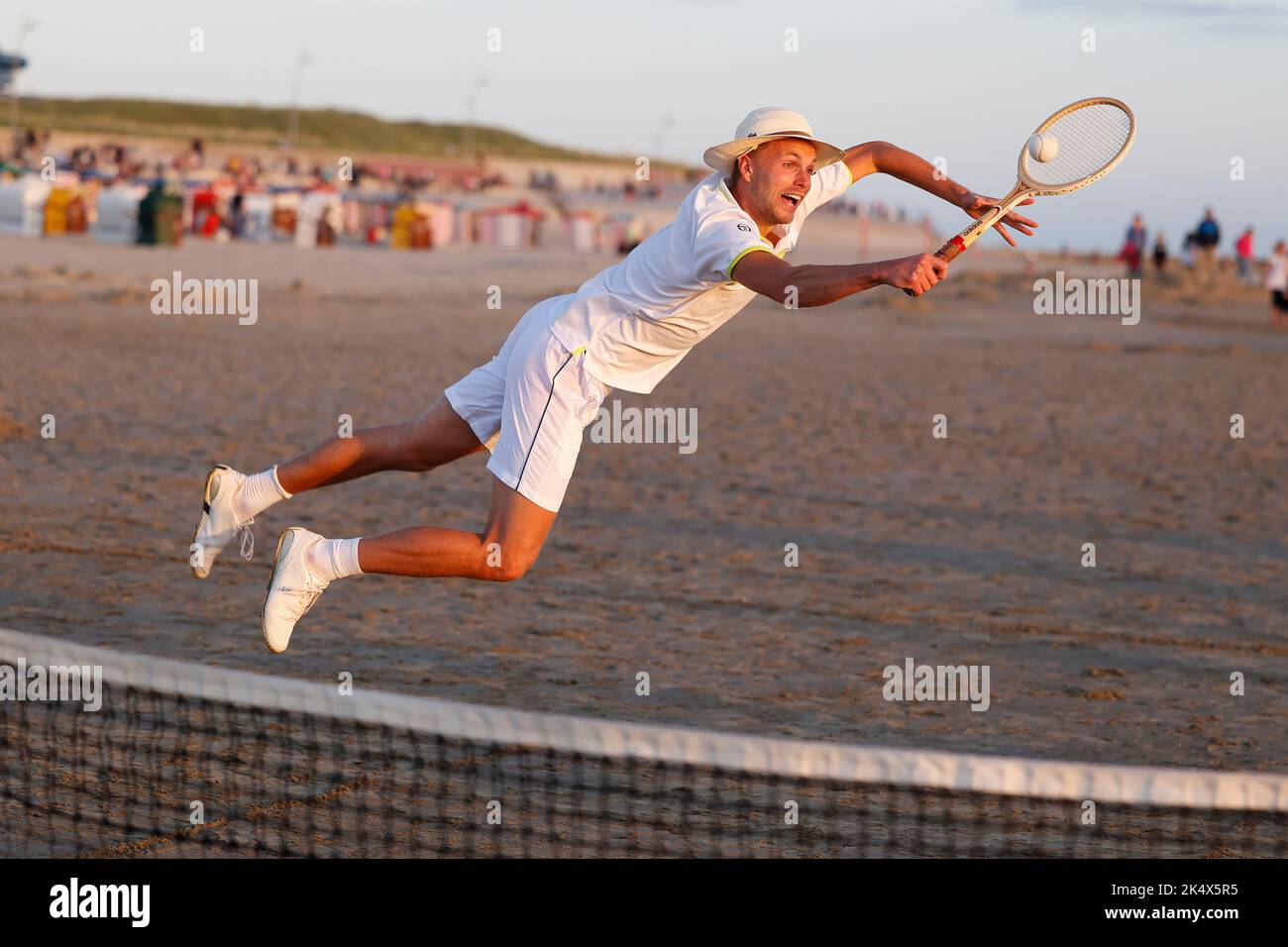 Retro tennis on the beach in the evening sun on the island of Borkum, Germany Stock Photo