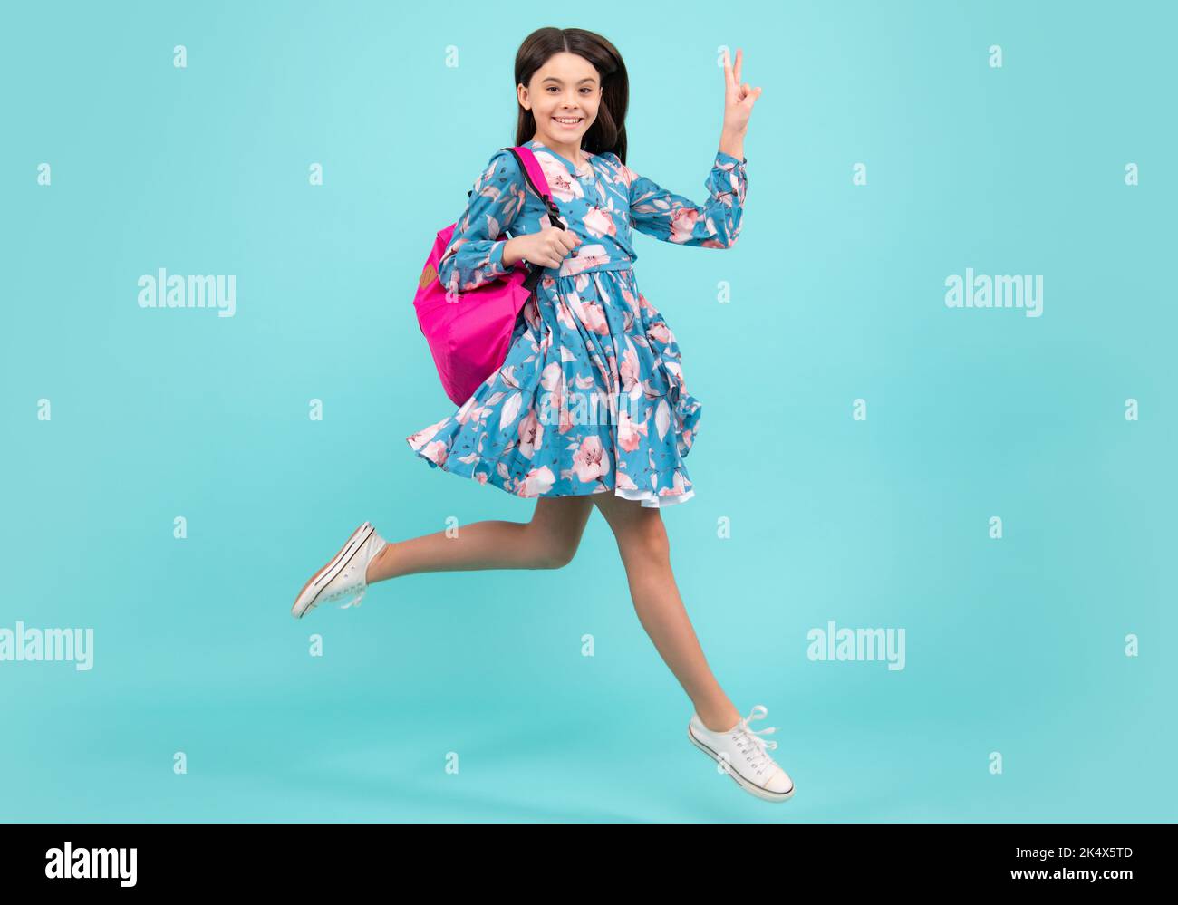 School teen with backpack. Teenager student, isolated background. Run