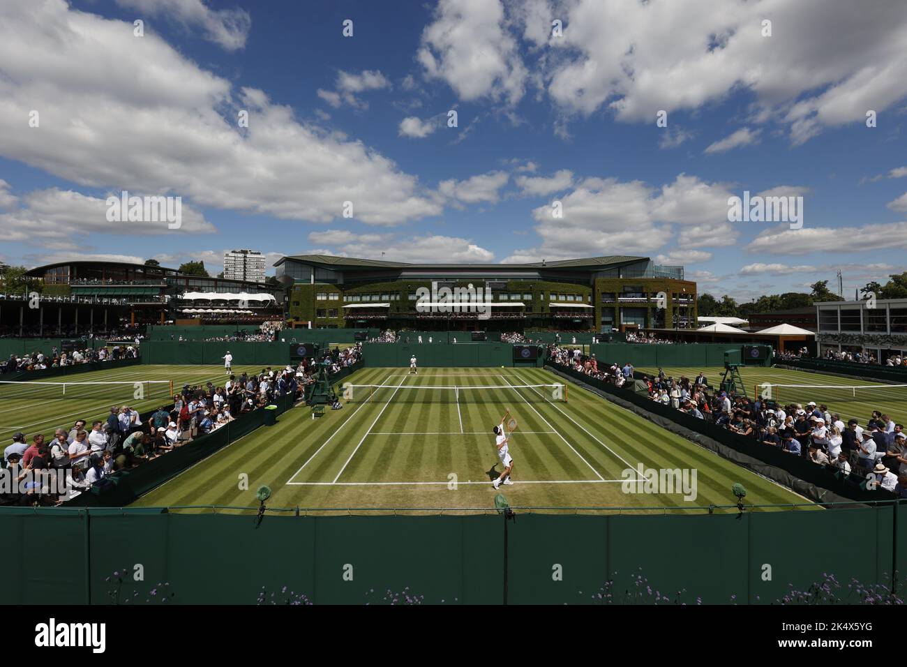 Panoramic view of outside courts with Centre Court building in the background, 2022 Wimbledon Championships, London, England, United Kingdom Stock Photo