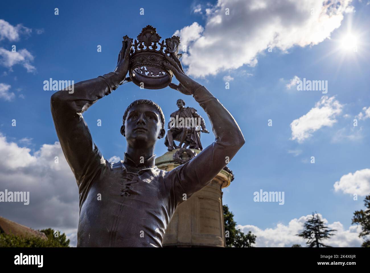 A statue of the character Prince Hal (Henry V) and William Shakespeare on the apex of the Gower Monument, Stratford Upon Avon, England Stock Photo