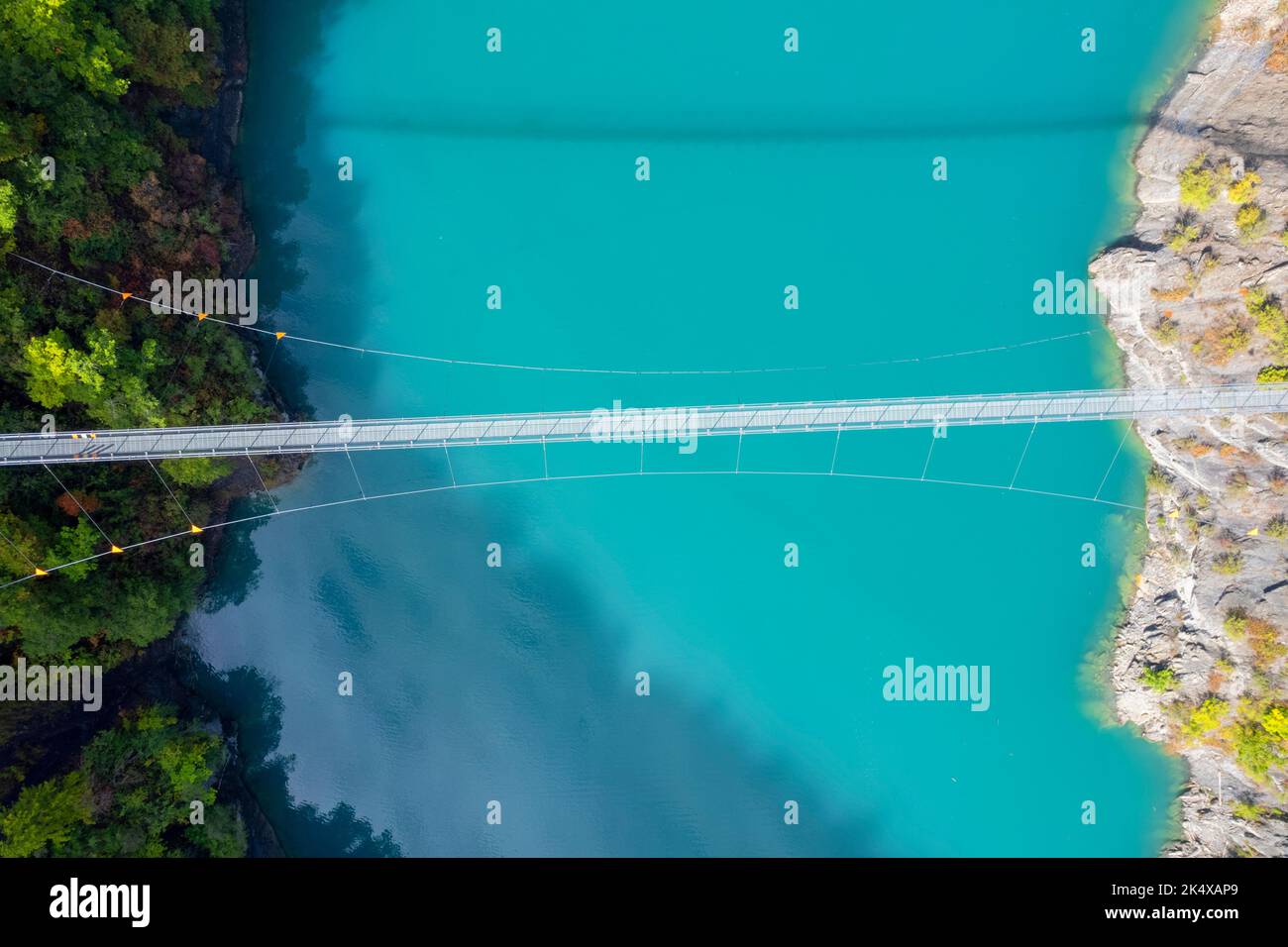 Aerial view of himalayan footbridge crossing the Drac near Lake Monteynard; France. Stock Photo