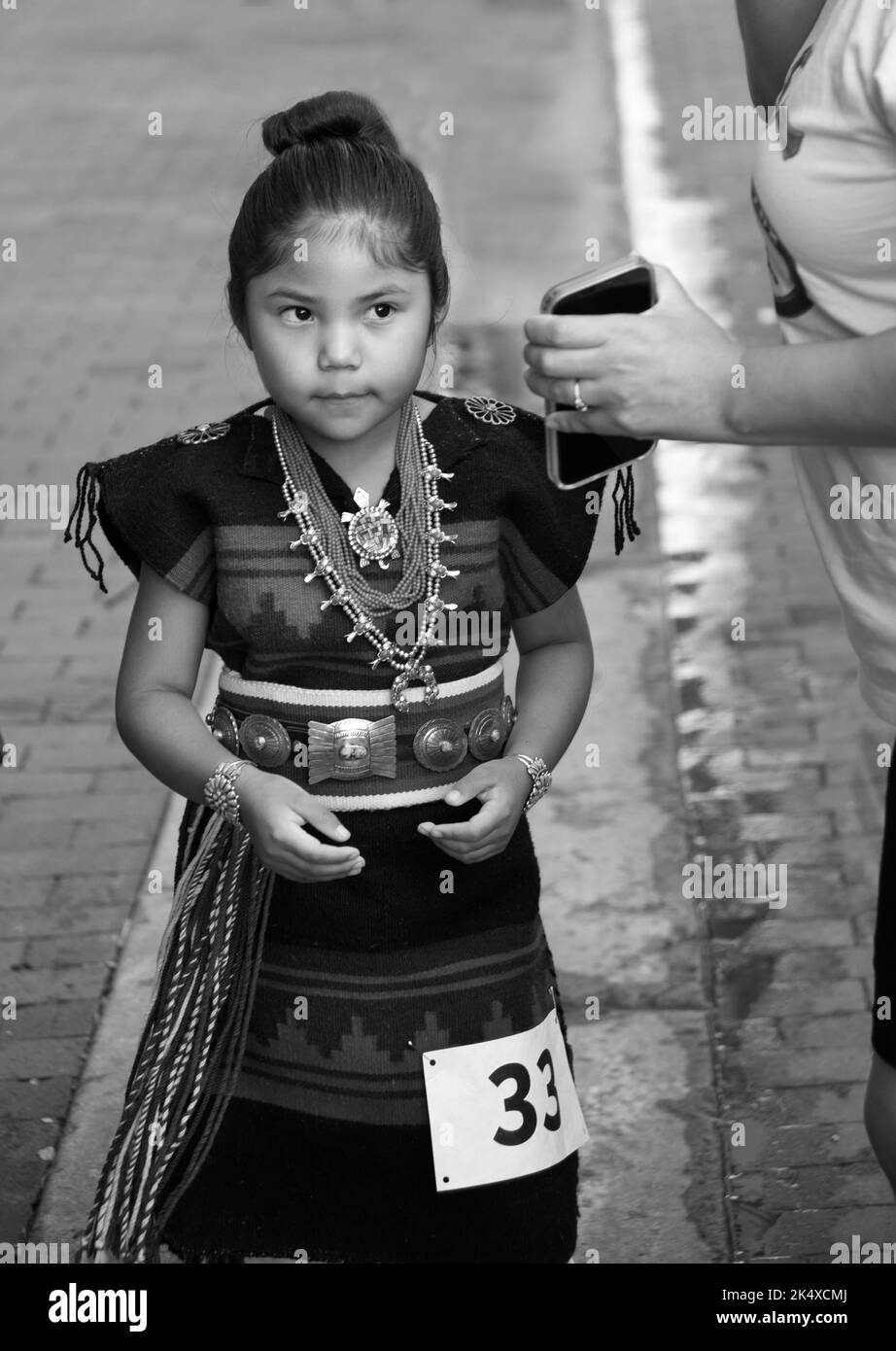 A young Native American girl (Navajo) waits her turn to compete in the