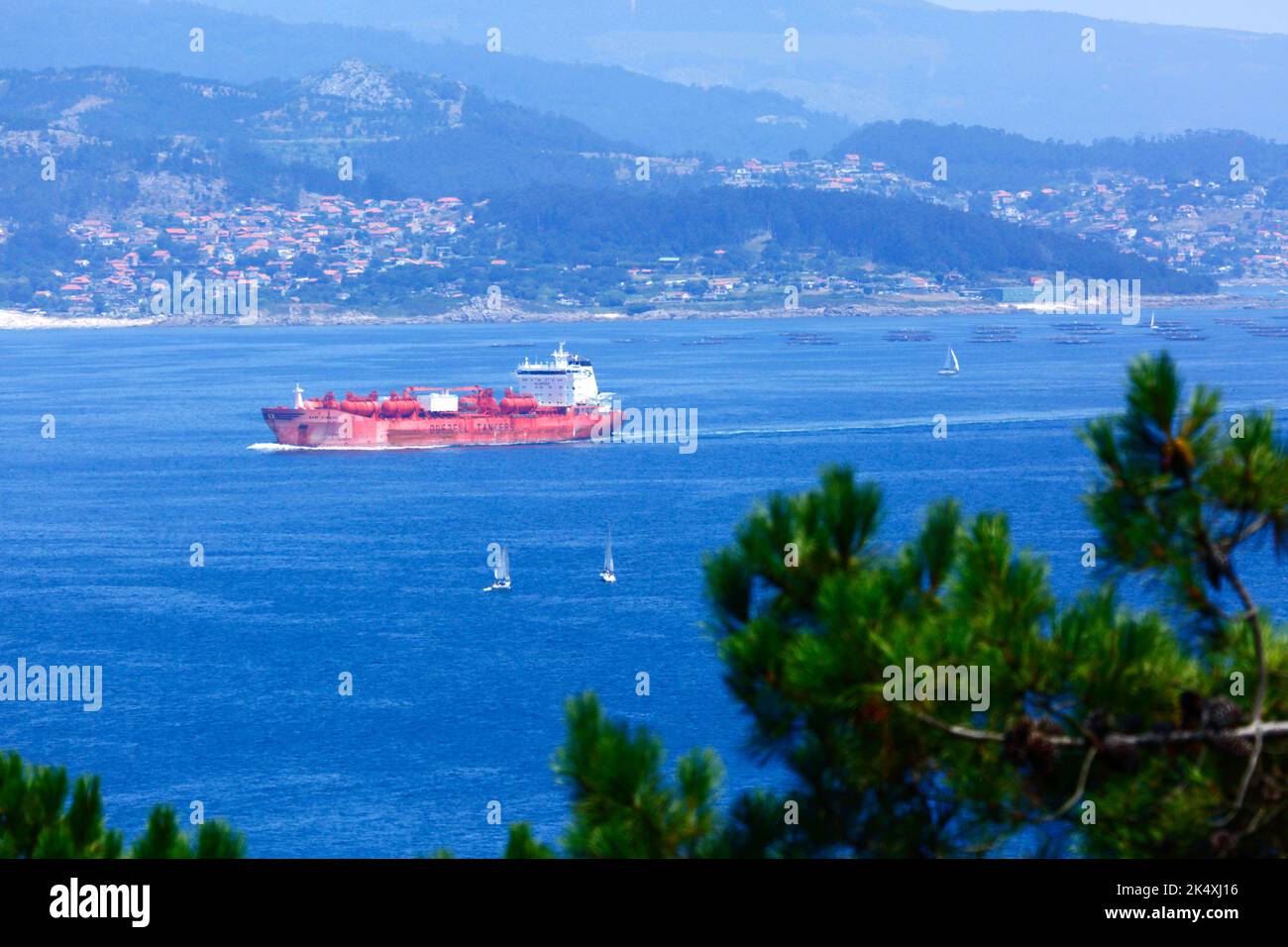 The Bow Summer (a chemical tanker owned by Norwegian company Odfjell Tankers) passing the Cies Islands as it leaves the Ria de Vigo, Galicia, Spain Stock Photo