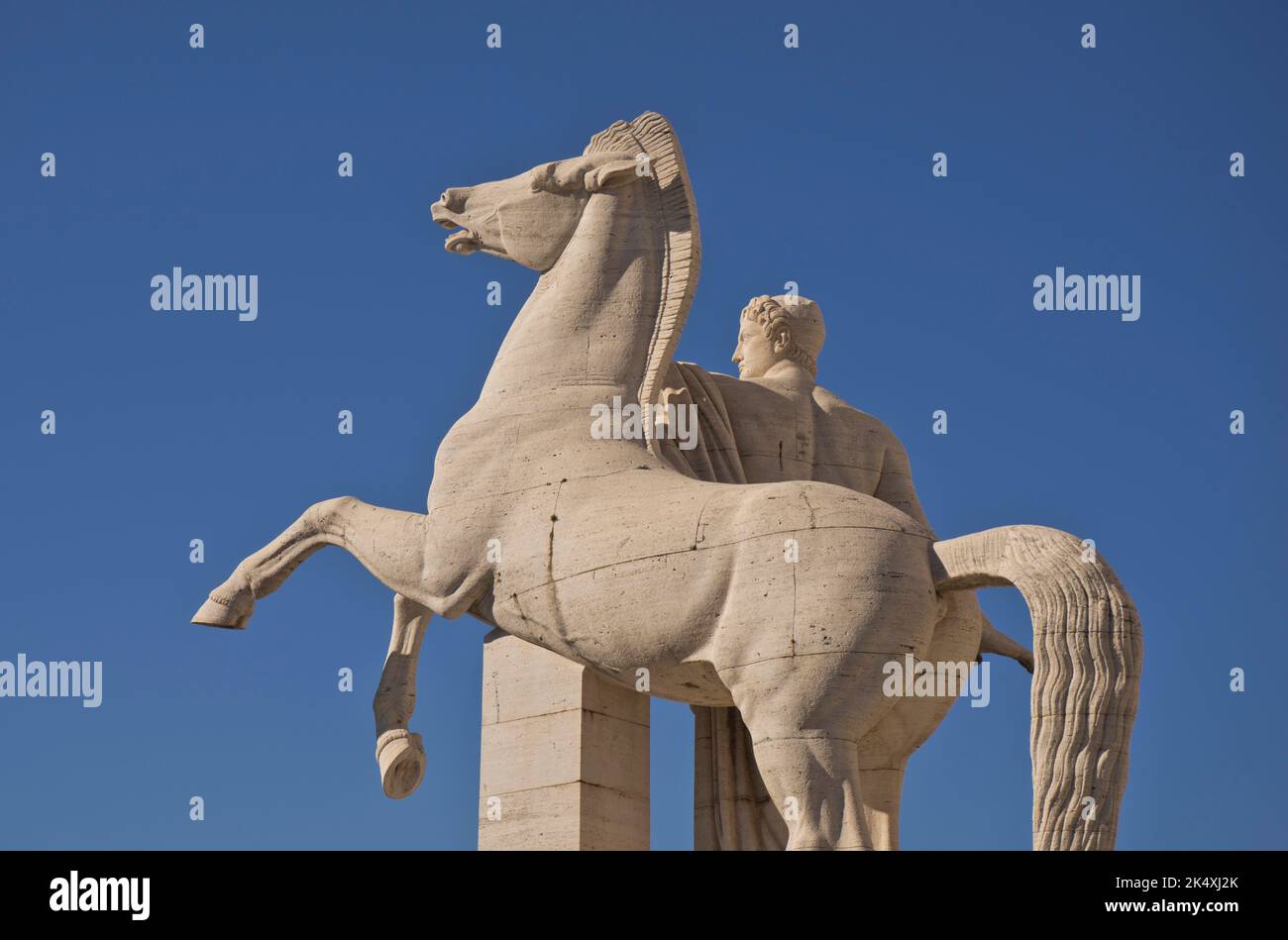 Views of buildings and statues at the EUR (Esposizione Universale Roma) district, with Fascist-era architecture from 1942 at the time of Mussolini. Ro Stock Photo