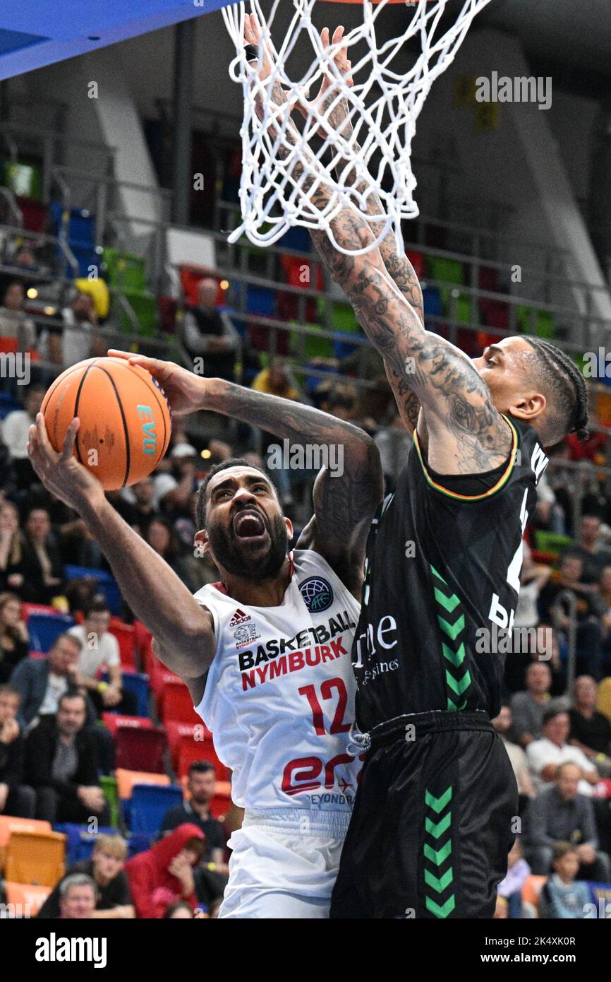 Prague, Czech Republic. 04th Oct, 2022. Gerel Simmons of Nymburk, left, and Michale Kyser of Bilbao in action during the men's Champions League, Group D, 1st round match ERA Nymburk vs Bilbao in Prague, Czech Republic, October 4, 2022. Credit: Michal Kamaryt/CTK Photo/Alamy Live News Stock Photo
