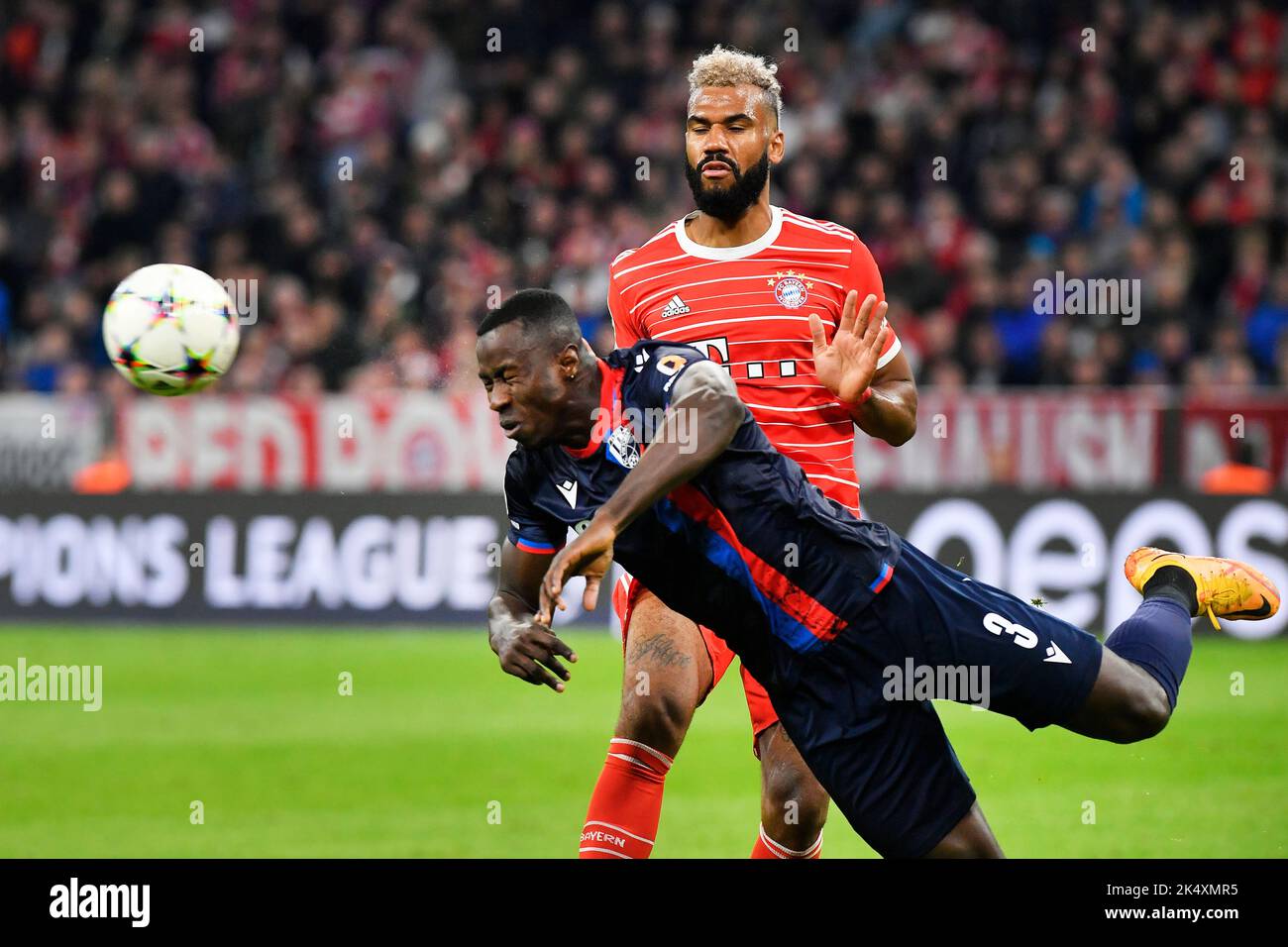 Mnichov, Germany. 04th Oct, 2022. Mohamed Tijani of Plzen, left, and Eric Maxim Choupo-Moting of Bayern in action during the Champions League, 3rd round, Group C match Bayern Munich vs Viktoria Plzen in Munich, Germany, October 4, 2022. At right is Lukas Hejda of Plzen. Credit: Miroslav Chaloupka/CTK Photo/Alamy Live News Stock Photo