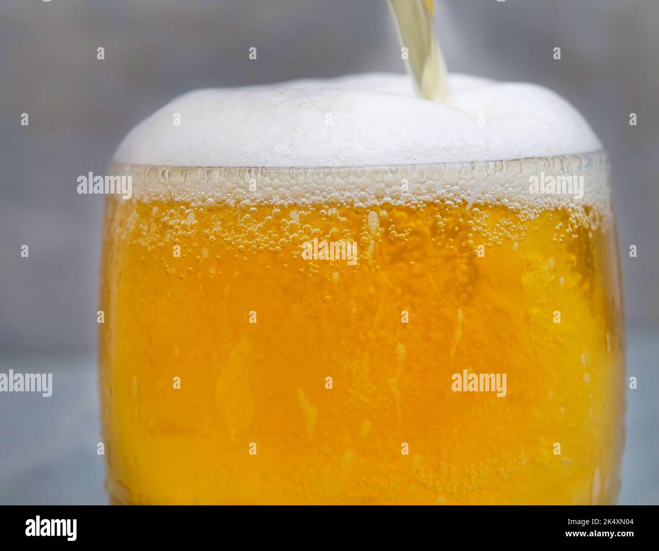 Pouring cold beer glass closeup hi-res stock photography and images - Alamy