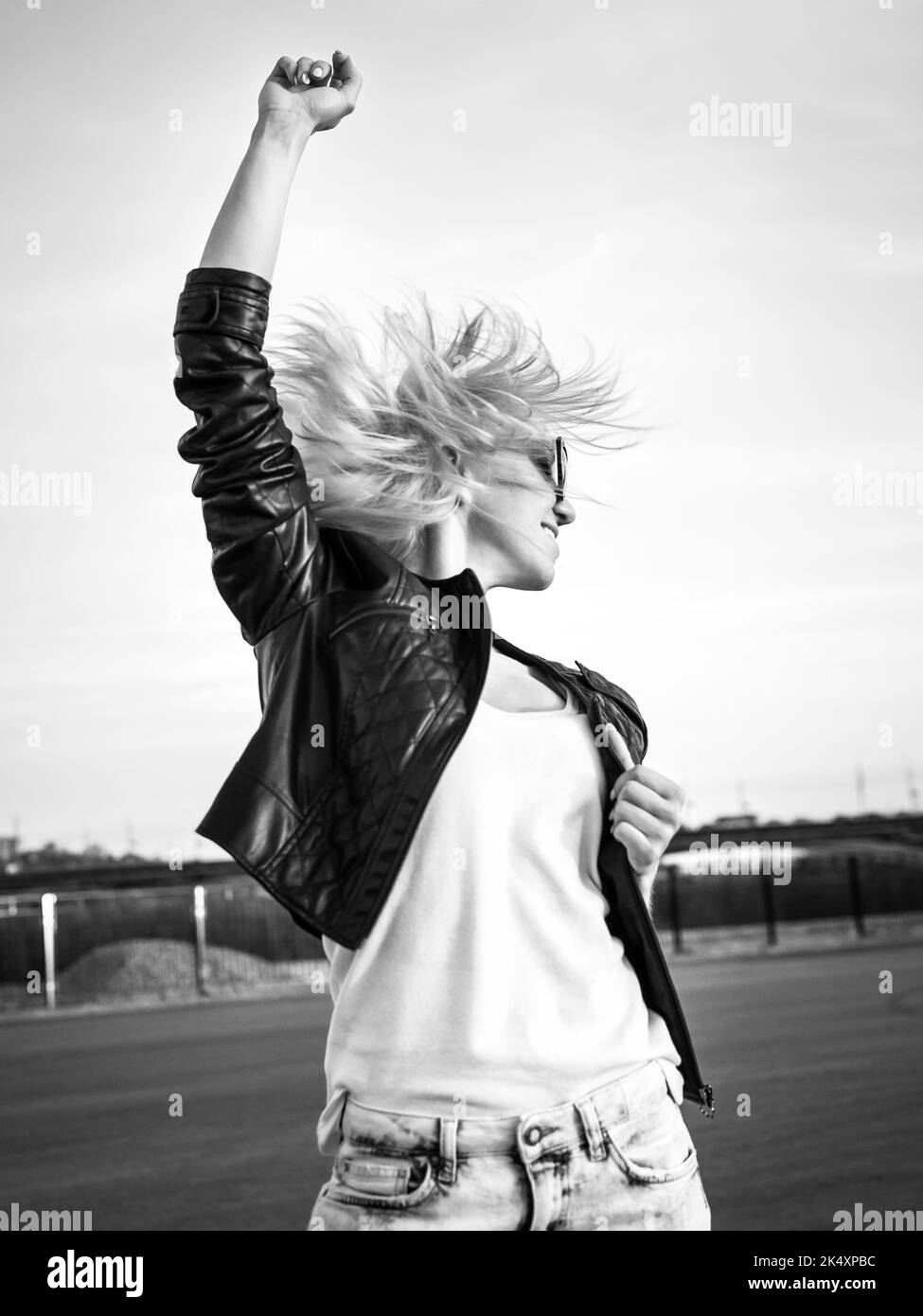 Beautiful girl with glasses posing and smiling Stock Photo Alamy