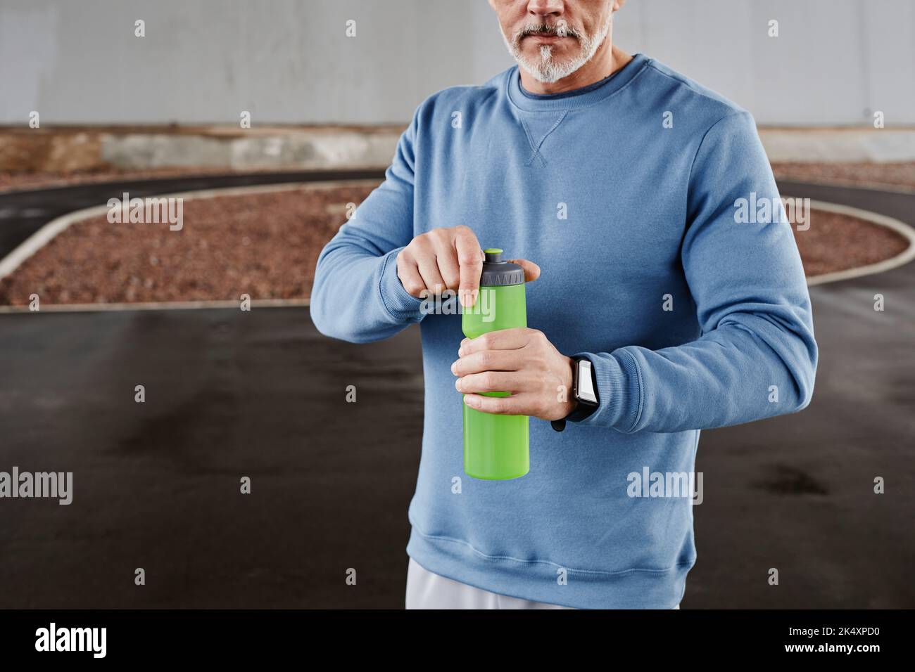 Man Holding Water Bottle Stock Photo 401572528
