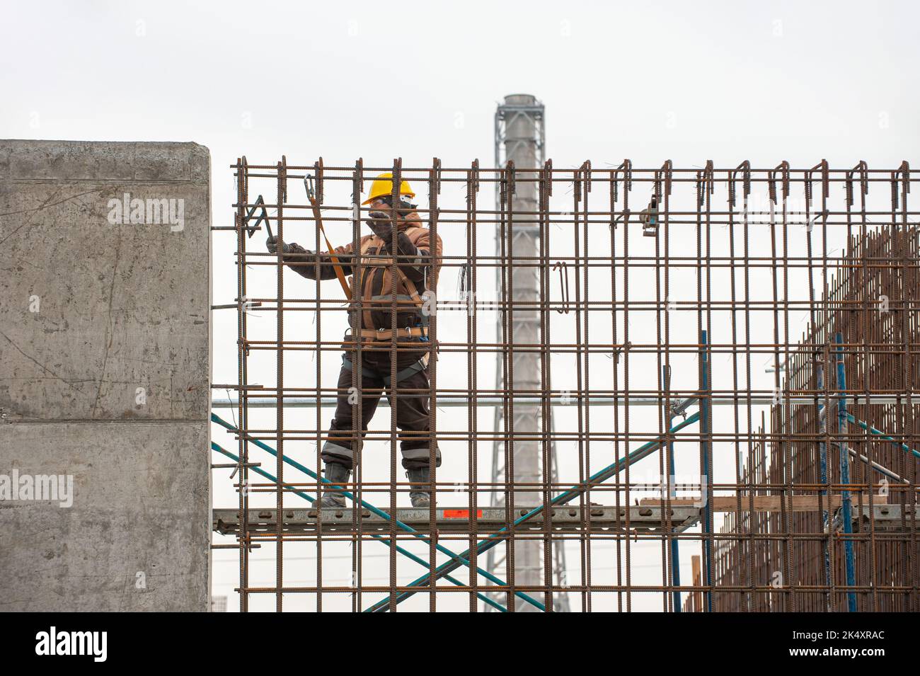 A man working on scaffolding Stock Photo