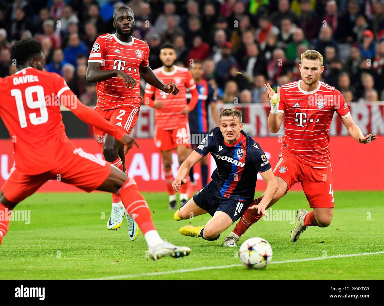 Mnichov, Germany. 04th Oct, 2022. (L-R) Alphonso Davies and Dayot Upamecano of Bayern, Jan Kopic of Plzen and Matthijs de Ligt of Bayern in action during the Champions League, 3rd round, Group C match Bayern Munich vs Viktoria Plzen in Munich, Germany, October 4, 2022. Credit: Miroslav Chaloupka/CTK Photo/Alamy Live News Stock Photo
