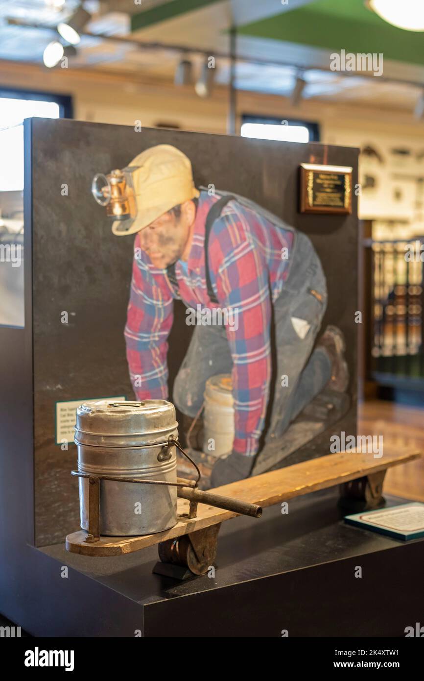 Beckley, West Virginia - A miner's scooter, used as an alternative to crawling in low-seam coal mines, on display in the mine museum at the Beckley Ex Stock Photo