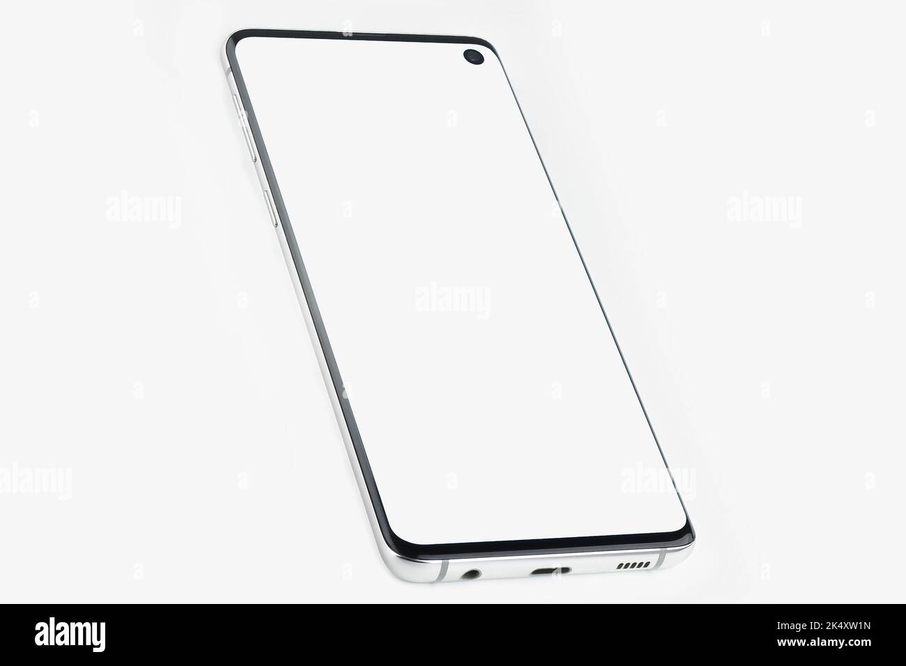 Smartphone with a white display on a white isolated background. Copyspace Stock Photo