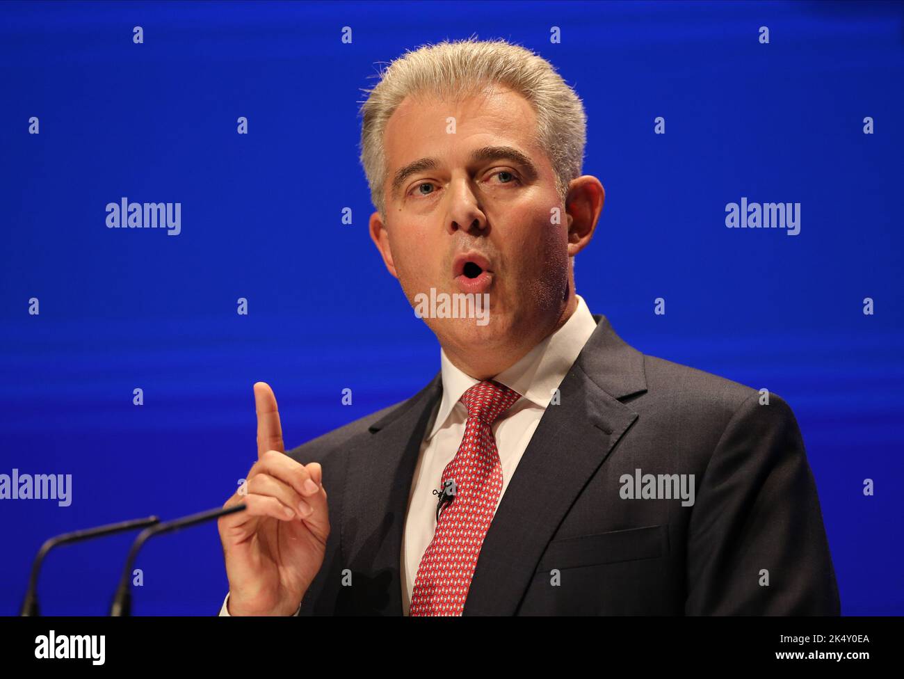 Birmingham, UK. 4 October, 2022. Justice Secretary Brandon Lewis delivers his speech during the Conservative Party's annual conference at the International Convention Centre in Birmingham. Picture date: Monday October 4, 2022. Credit: Isabel Infantes/Empics/Alamy Live News Stock Photo