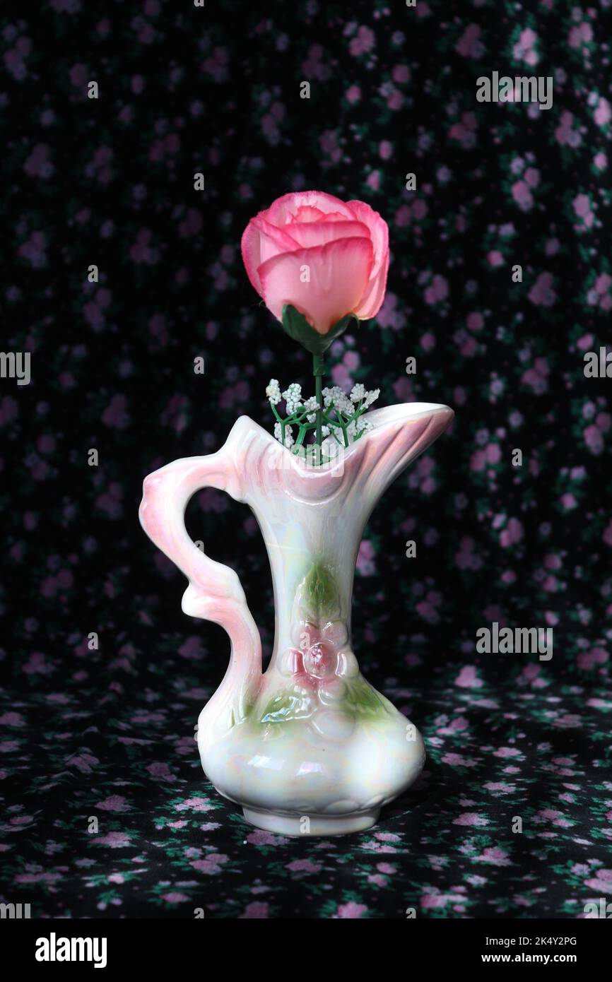 Porcelain Vase with artificial flower Stock Photo