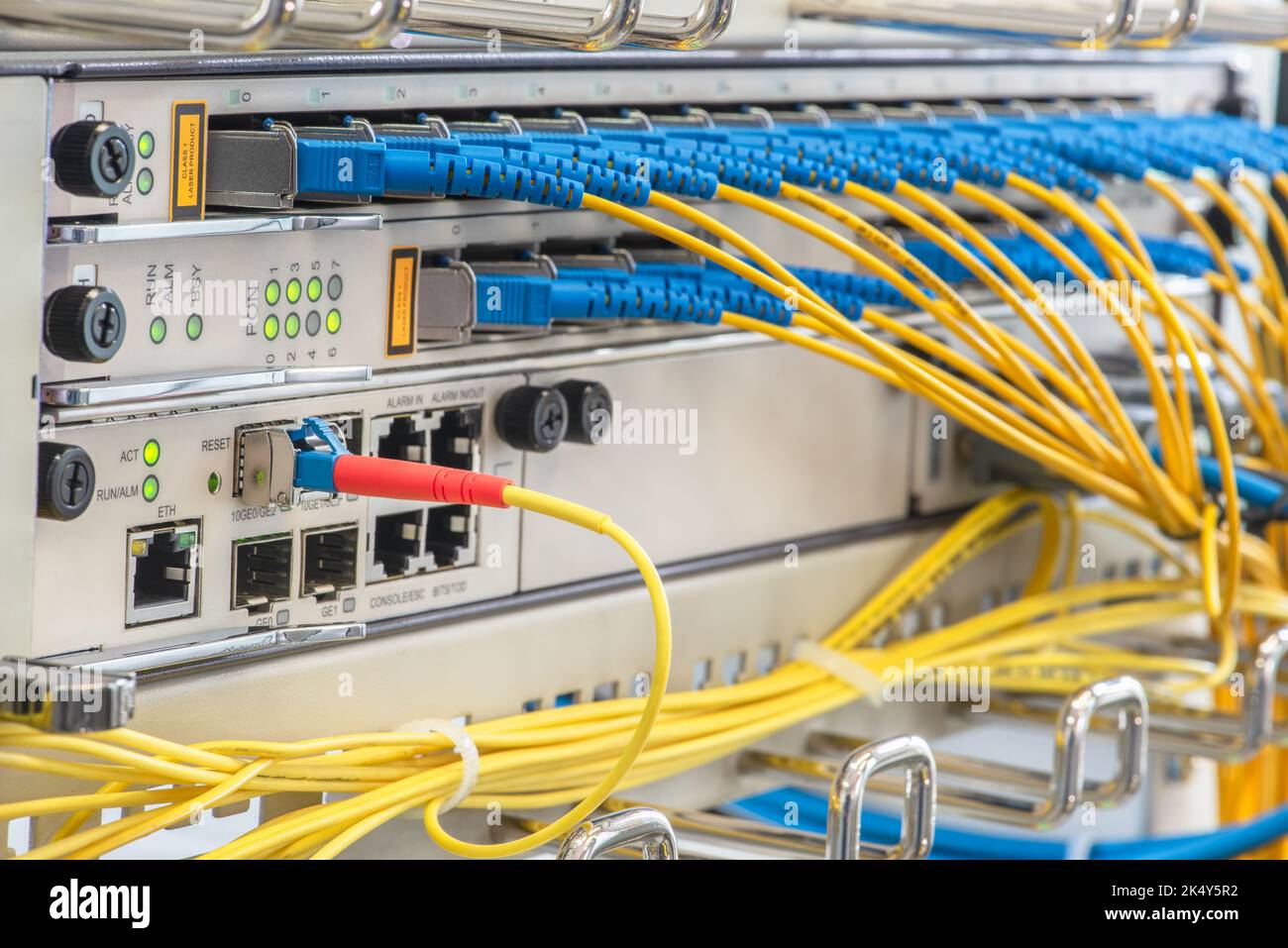 Fiber Optic Patch Cords Connected to Optical Line Terminal Stock Photo