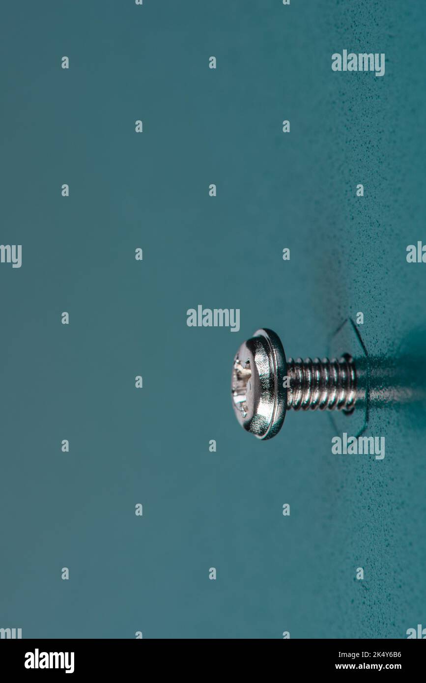 Screw and Nut in Metal Surface Texture Stock Photo