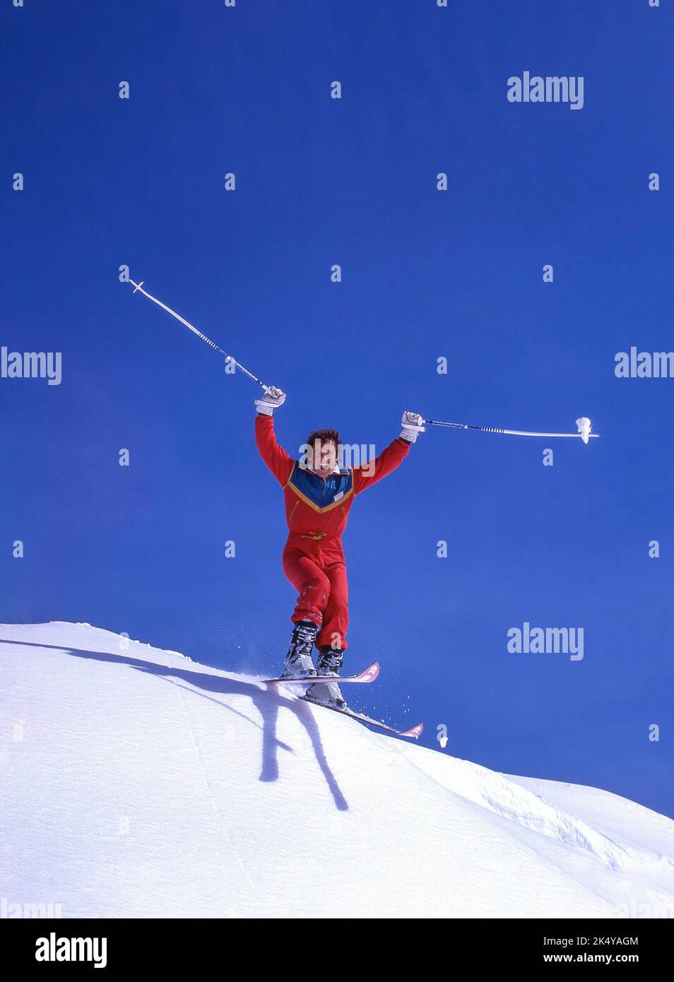 Young male skier jumping on slopes, Verbier, Canton du Valais, Switzerland Stock Photo