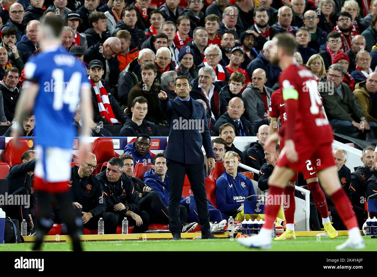 Liverpool, UK. 04th Oct, 2022. Rangers Manager Giovanni van Bronckhorst (c) shouts instructions. UEFA Champions league, group A match, Liverpool v Rangers at Anfield Stadium in Liverpool on Tuesday 4th October 2022. this image may only be used for Editorial purposes. Editorial use only, license required for commercial use. No use in betting, games or a single club/league/player publications. pic by Chris Stading/Andrew Orchard sports photography/Alamy Live news Credit: Andrew Orchard sports photography/Alamy Live News Stock Photo
