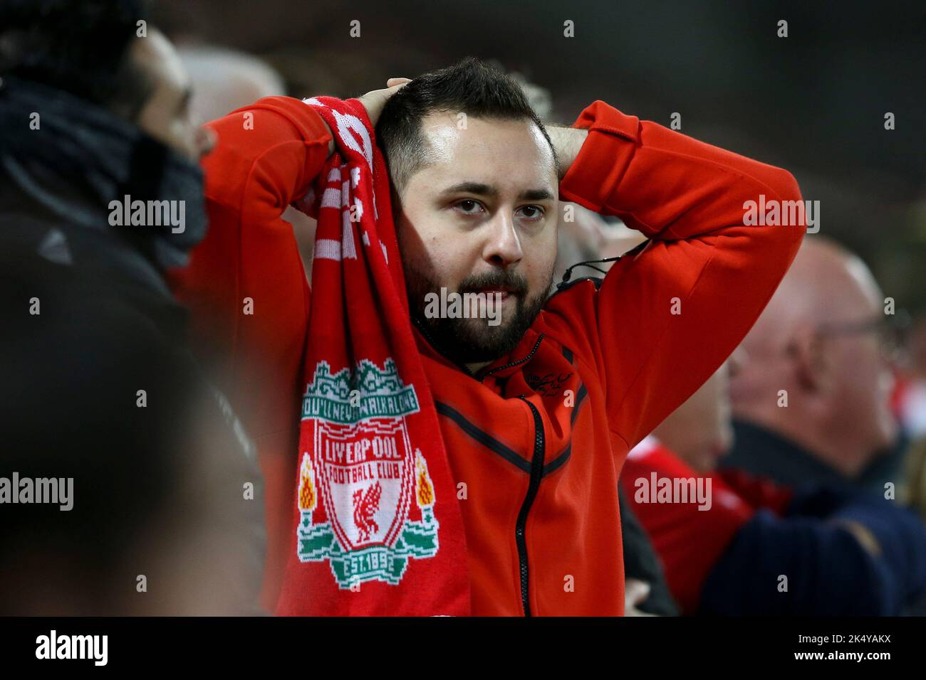 Liverpool, UK. 04th Oct, 2022. A Liverpool supporter reacts to his team missing a chance. UEFA Champions league, group A match, Liverpool v Rangers at Anfield Stadium in Liverpool on Tuesday 4th October 2022. this image may only be used for Editorial purposes. Editorial use only, license required for commercial use. No use in betting, games or a single club/league/player publications. pic by Chris Stading/Andrew Orchard sports photography/Alamy Live news Credit: Andrew Orchard sports photography/Alamy Live News Stock Photo