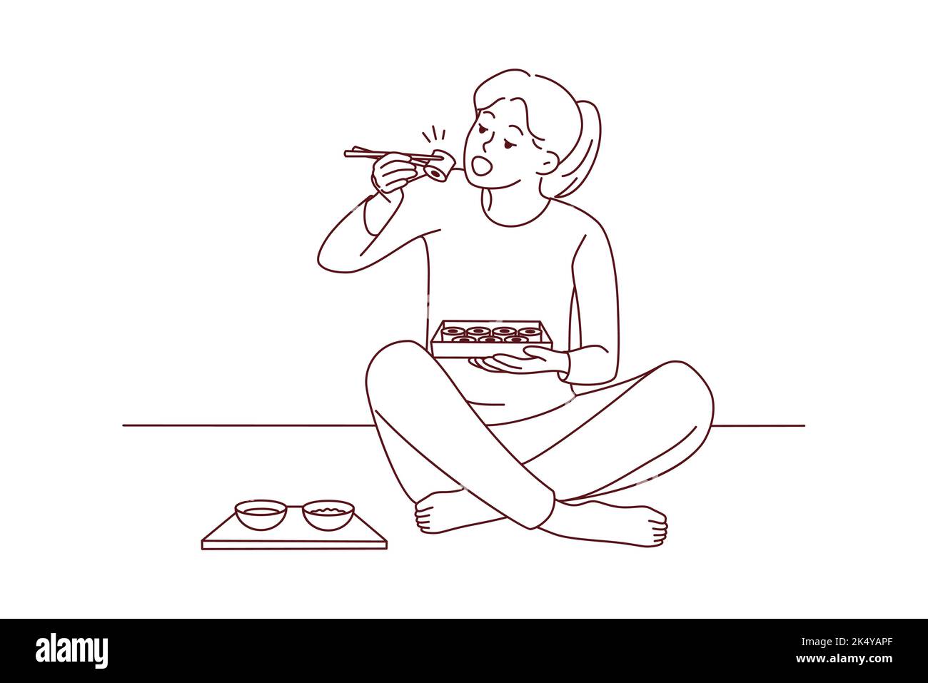 Happy young woman sit on floor eating sushi with chopsticks. Millennial