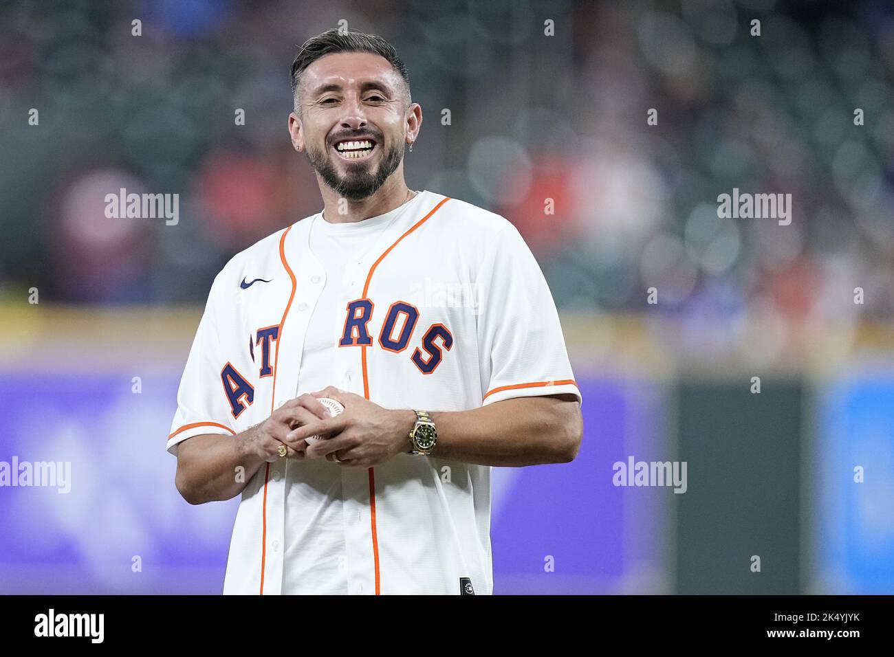 Houston, United States. 04th Oct, 2022. Héctor Herrera, a footballer from the Mexico national team and the Houston Dynamo, throws out the ceremonial first pitch before a game between the Houston Astros and the Philadelphia Phillies at Minute Maid Park in Houston, Texas on Tuesday, October 4, 2022. Photo by Kevin M. Cox/UPI Credit: UPI/Alamy Live News Stock Photo