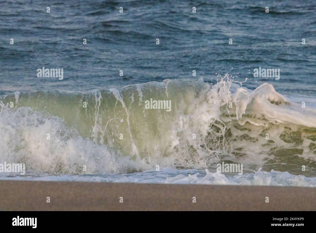 Waves crashing at Cape Henlopen State Park near Lewes and Rehoboth Beach, Delaware Stock Photo