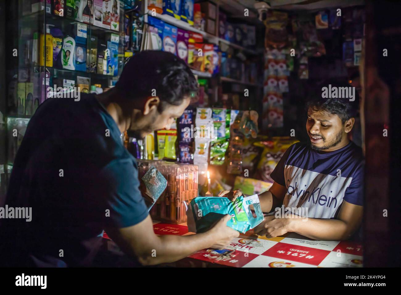 Customers bring their rechargeable lights to shopkeepers for recharging ...