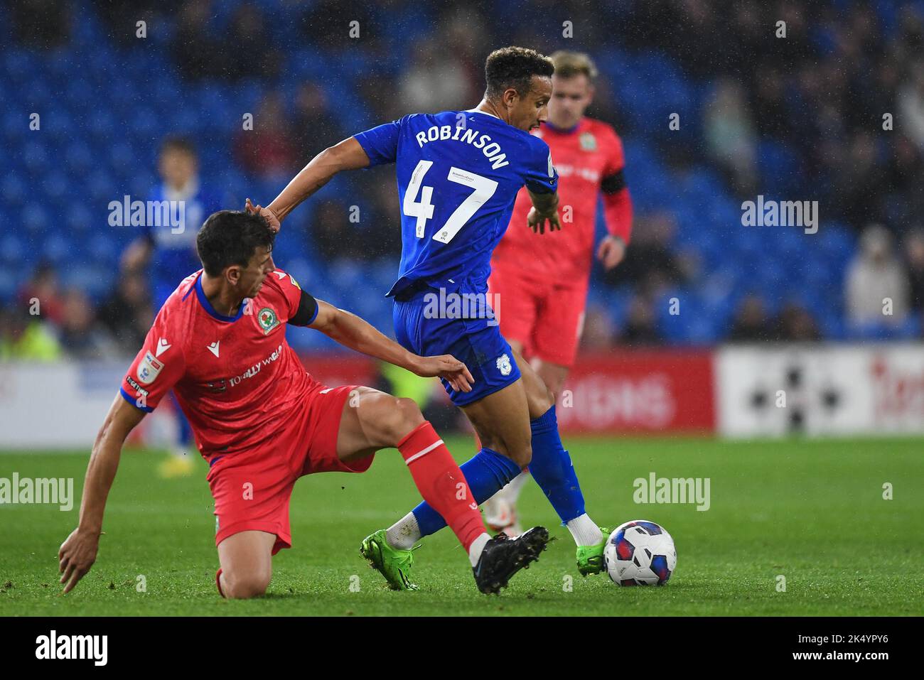 John Buckley #21 of Blackburn Rovers Under pressure fromAndy Rinomhota #35  of Cardiff City during the Sky Bet Championship match Cardiff City vs  Blackburn Rovers at Cardiff City Stadium, Cardiff, United Kingdom