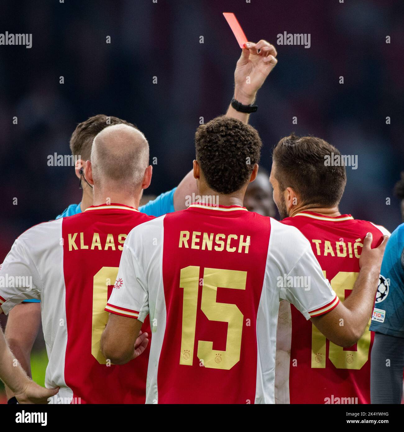 Dusan Tadic of Ajax receives a red card during the UEFA Champions
