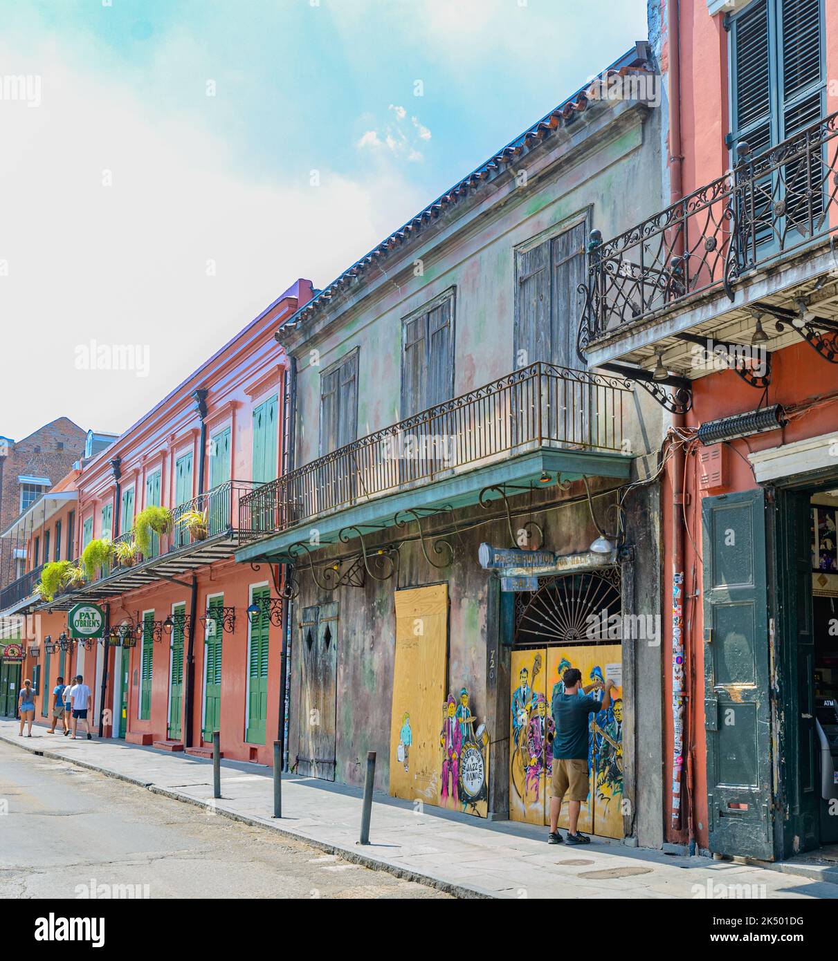 NEW ORLEANS, LA, USA - JUNE 20, 2020: Cityscape of French Quarter featuring Preservation Hall and Pat O'Brien's on St. Peter Street Stock Photo