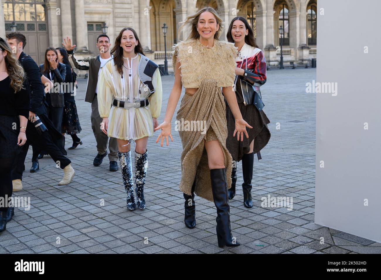 Este Haim and Alana Haim attending the Louis Vuitton Womenswear