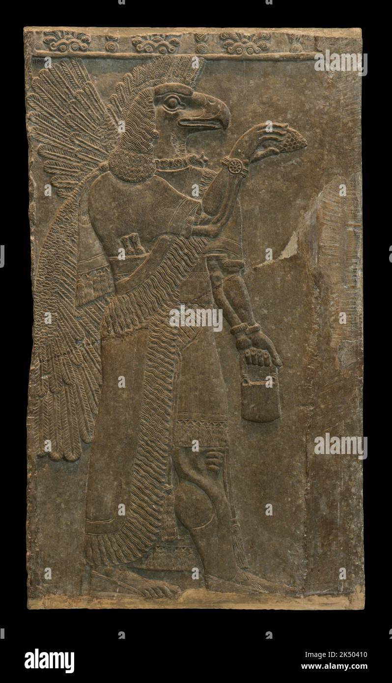 Eagle headed protective spirit, Nimrud Stock Photo