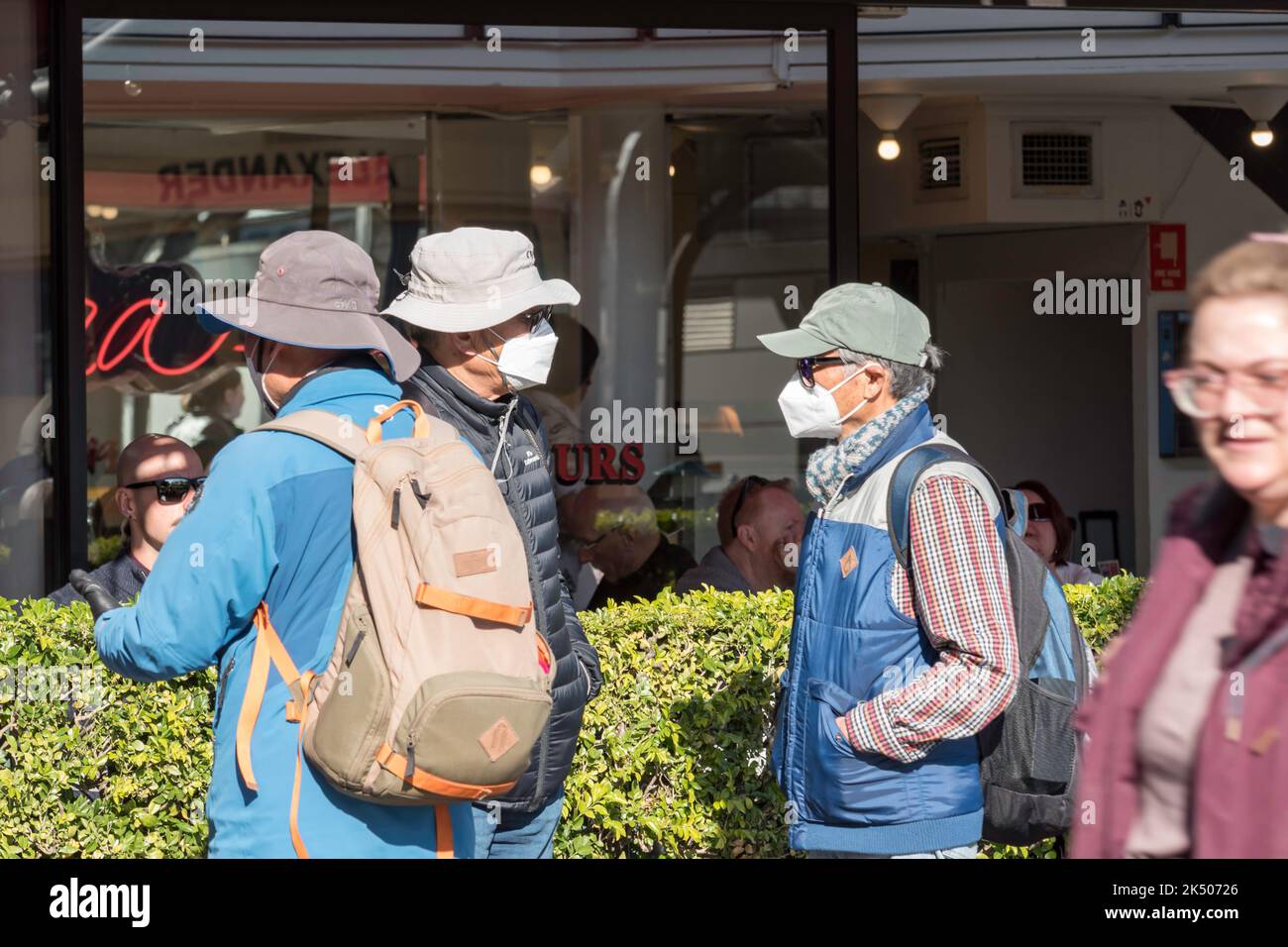 Sydney Australia July 2022 People wearing face masks outside a