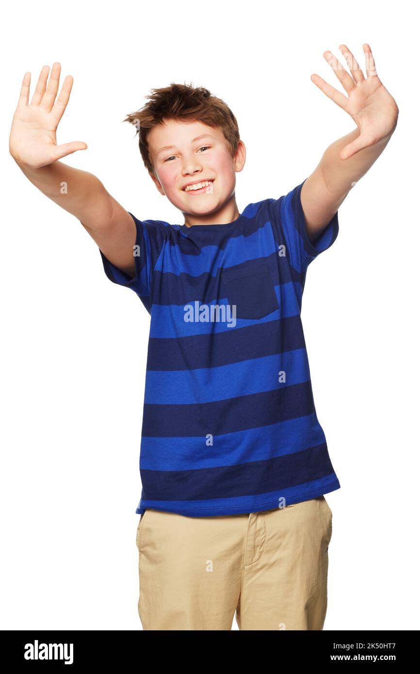 Look mom I washed my hands. Portrait of a young boy standing with his hands raised. Stock Photo
