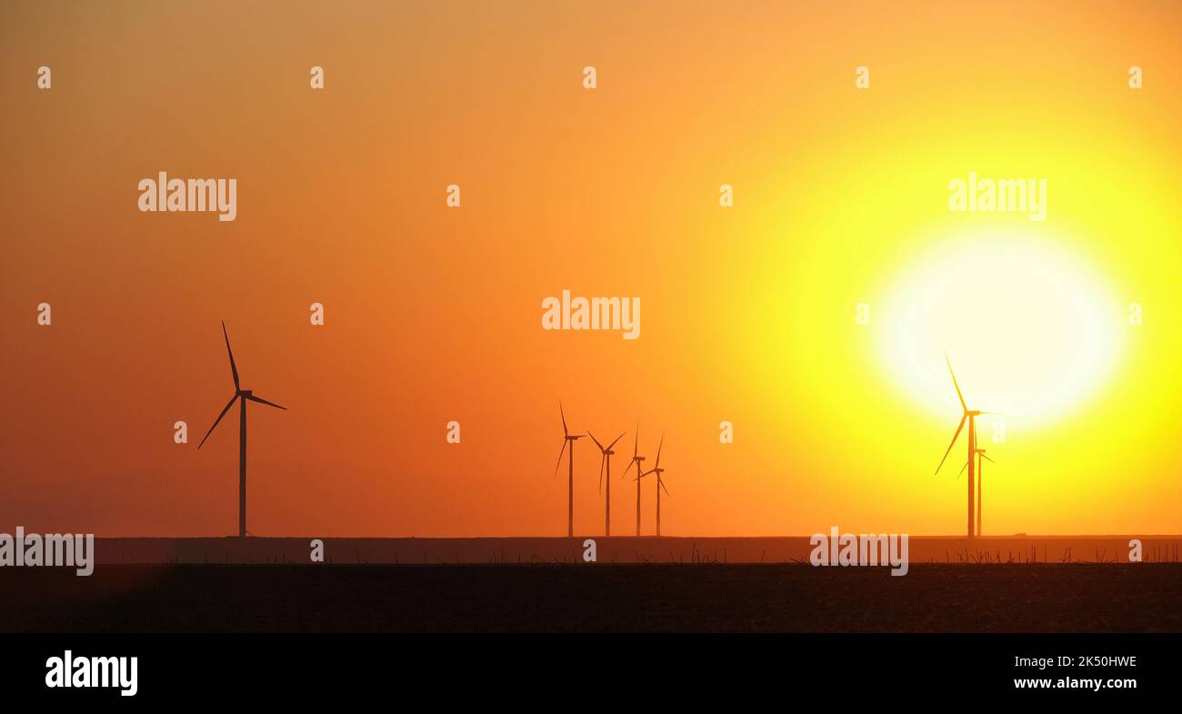Wind turbine silhouette on beautiful sunset landscape Stock Photo - Alamy