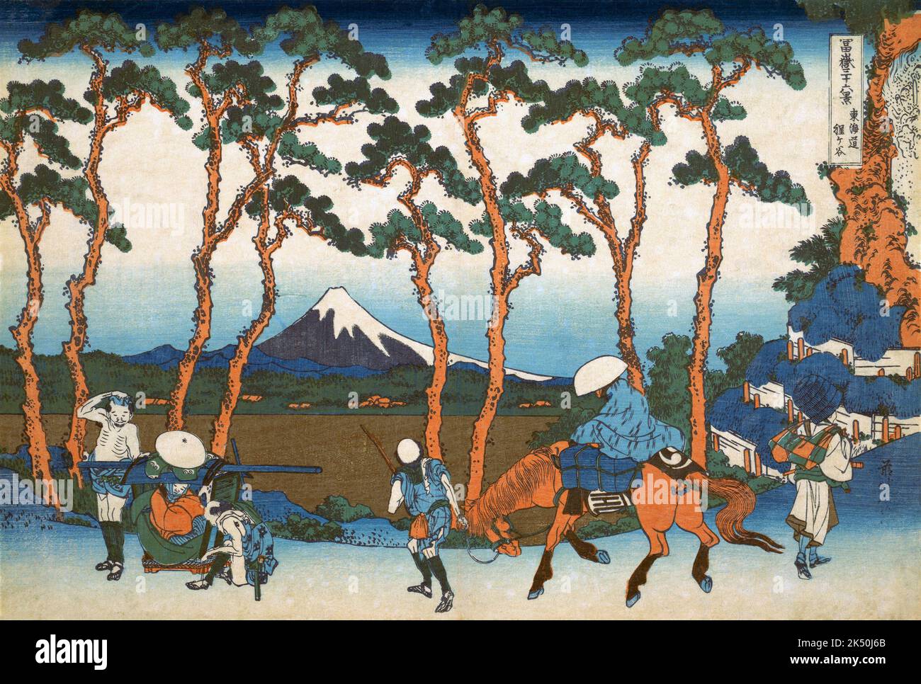 Japan: ‘Hodogaya on the Tokaido Road’. Ukiyo-e woodblock print from the series ‘Thirty-Six Views of Mount Fuji’ by Katsushika Hokusai (31 October 1760 - 10 May 1849), 1830.  ‘Thirty-six Views of Mount Fuji’ is an ‘ukiyo-e’ series of woodcut prints by Japanese artist Katsushika Hokusai. The series depicts Mount Fuji in differing seasons and weather conditions from a variety of places and distances. It actually consists of 46 prints created between 1826 and 1833. The first 36 were included in the original publication and, due to their popularity, 10 more were added after the original publication Stock Photo